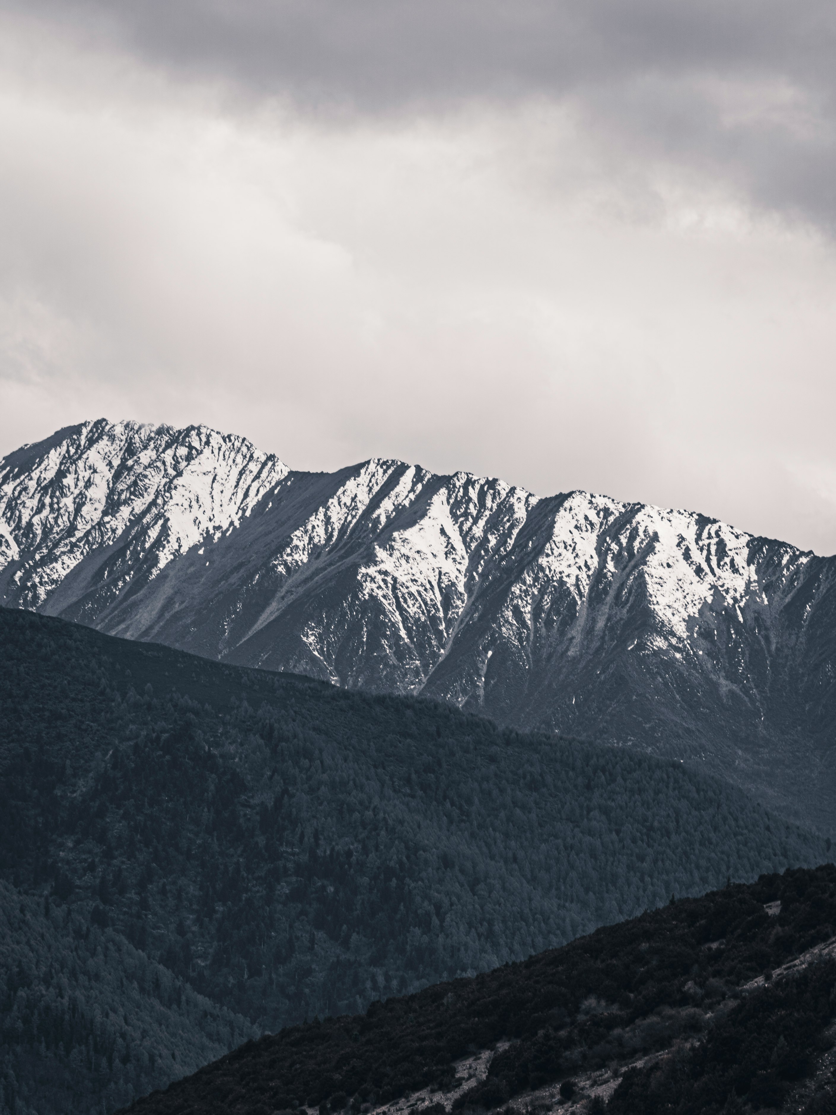 snow covered mountain during daytime